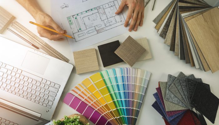 designer working in office doing furniture and flooring material